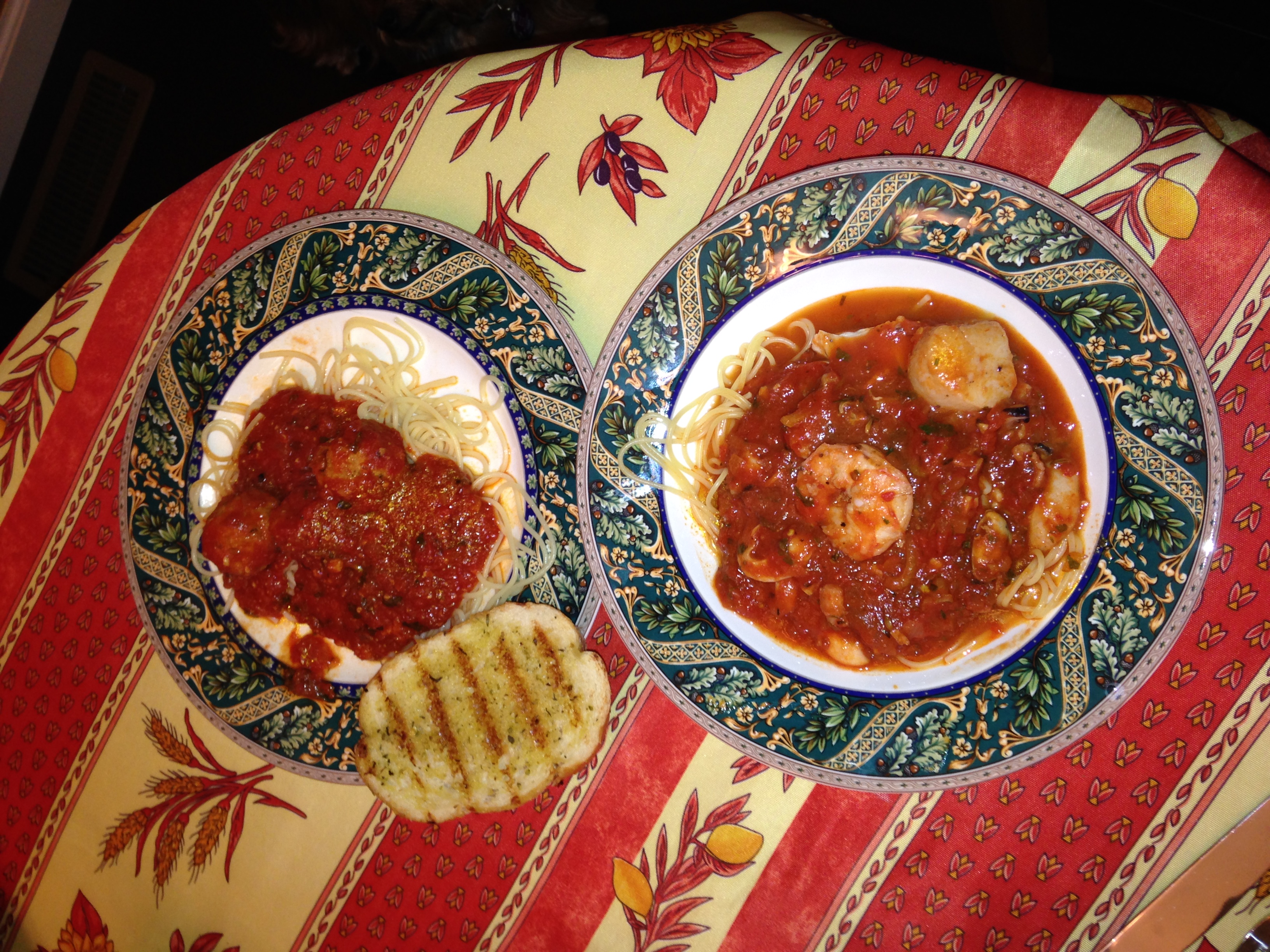 Bowl of Cioppino, Garlic Bread and Turkey Meatballs with Marinara Sauce