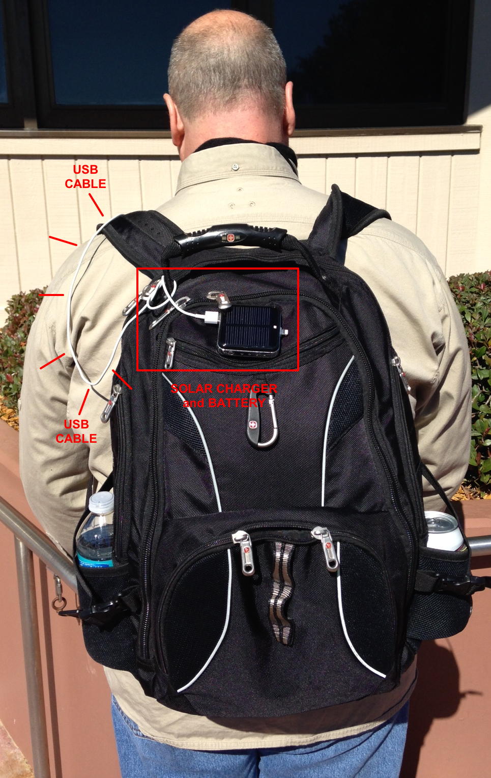 Here's the solar charging battery back, mounted with Velcro to the backpack.
