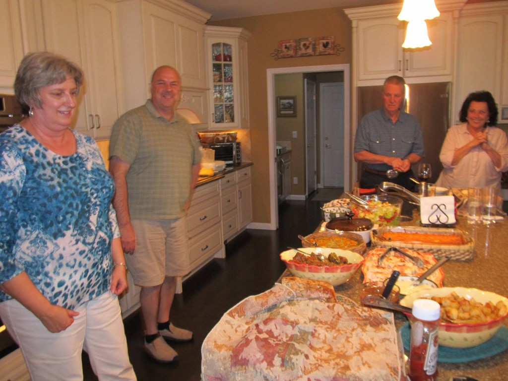 Nancy, Me, Jim S and Kathy V.  Almost time to dig in