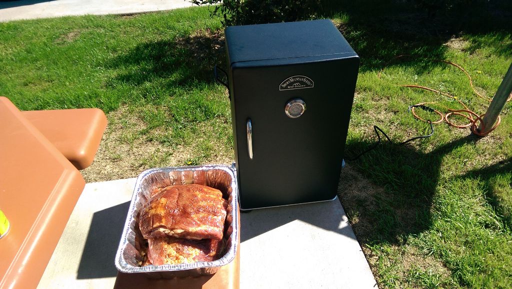 Smoker with Ribs Out in Pan